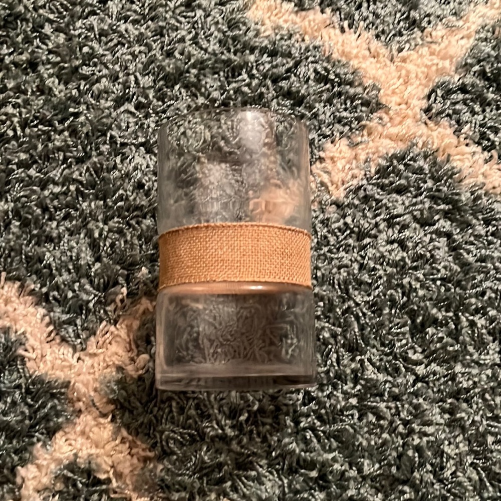 Glass vase with burlap accent